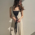 Sophia Richie Dupe.Chanel inspired Chanel designer inspired two piece dress. resort piece. wedding looks for Sophia Richie. Cream and Black Trim Floor length dress