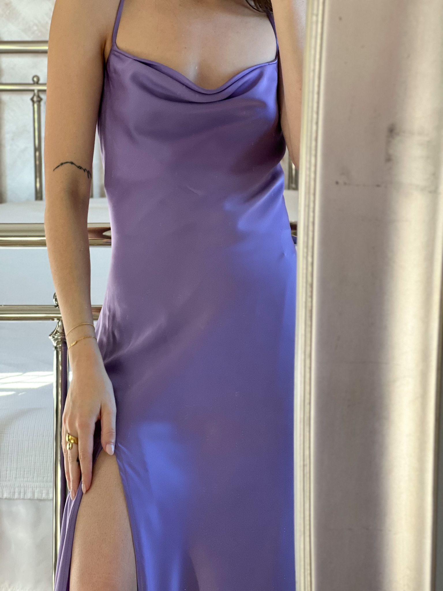 Purple slip dress with slit. Cross back steps and halter neckline